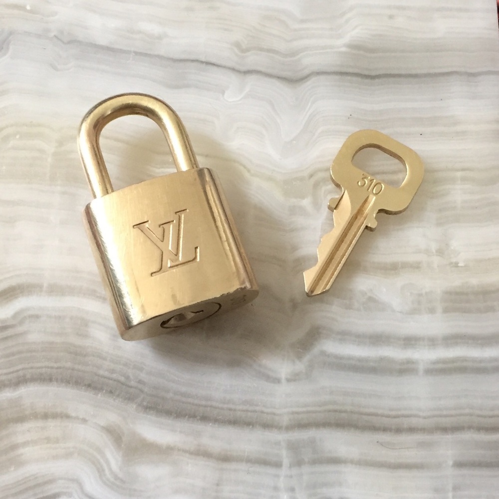 Louis Vuitton lock and key set authentic Brass gold tone